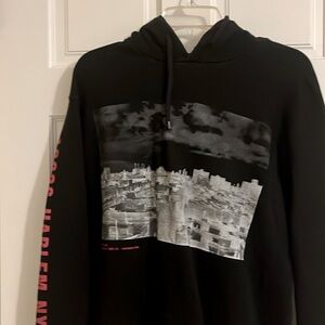 Three black sweatshirts/hoodies size large